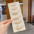 Set of 6 gold pearl decorative safety pins for collar styling on white card display - XinYu Six Piece Set