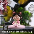 Cute Tang Dynasty lady figurine in pink dress with green fan and lotus base accessory - Green Ruyi Phone Holder