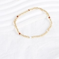 Macro shot of boho seed bead bracelet featuring light yellow, brown and white glass beads - Light Yellow