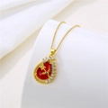 Close-up of elegant red teardrop necklace with gold leaf details and zircon stones - Red
