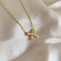 Elegant gold bow necklace with micro-pave sparkling crystals on silk background - Titanium Steel/Zircon / X730 Gold Bow