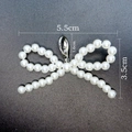 Pearly bow charm with silver lobster clasp and dimensional markings of 5.5cm width - 39-Bead Bow with Clasp