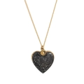 Detail of heart pendant with black glitter finish and gold accents on a dainty chain - Black Starry Sky Heart