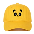 Detailed close-up of yellow cotton baseball cap featuring minimalist panda face embroidery - Yellow