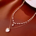 Close-up of double-layer gold necklace with freshwater pearls and heart pendant - 10# Double Layer Heart Round Gold Necklace