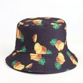 Detail of double-sided bucket hat featuring tropical pineapple print and reinforced stitching - M (56-58cm) / Navy Blue