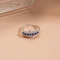 Detail of silver adjustable ring with seven blue gemstones and sparkling cubic zirconia - Blue Lace Style
