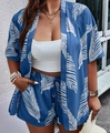 Detail of blue tropical leaf print two-piece set featuring a kimono cardigan and shorts - Blue