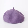 Detail view of purple wool beret showing soft textured fabric and small top stem - Adjustable / Purple