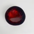 Handmade coconut shell bowl with natural exterior and polished red lacquered interior finish - Red Feather Style
