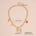 Golden stainless steel necklace with mushroom and vegetable charms on pink background - Stainless Steel / 3# Vegetable Necklace