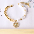 Golden chain bracelet with baroque pearls and a turquoise flower charm for women - Star