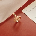 Close-up of golden snake ring with layered coil design and detailed scale texture - Gold