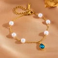 Gold stainless steel pearl bracelet featuring blue teardrop gemstone and adjustable chain - Blue Waterdrop Pearl Bracelet