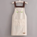 Minimalistisch beige waterdicht schort met bruine banden en smile-grafische borduur - Met letterprint / Beige