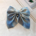 Blue white and yellow plaid fabric bow hair clip shown on a clean white background - Ice Cream Plaid