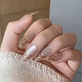 Close-up of long almond press-on nails with leopard print, gold lines, and pearl finish - BY1766 Short Almond / Phototherapy Glue Style