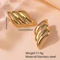 Golden seashell style stainless steel earrings with polished wave pattern finish - Stainless Steel Wavy Mirror Earrings