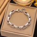 Chunky stainless steel hip hop bracelet with diagonal textured links and lobster clasp - Interlocked Rings Silver