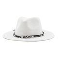 Close-up of white straw fedora featuring a bohemian beaded brown woven band detail - M (56-58cm) / White