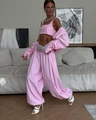 Detailed view of pink striped three-piece set with crop top, shirt, and trousers - Pink Jewelry Set