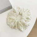 Elegant off-white tulle hair scrunchie with white pearl trim and silver glitter details - Off White