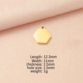 Colgante hexagonal de acero inoxidable dorado con medidas sobre fondo rosa - Bañado en Oro de 18K