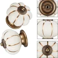Vintage pumpkin shape white ceramic drawer handle with bronze base and gold accents - White Pumpkin Gold Line