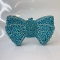 Elegant blue bow-shaped clutch bag covered in sparkling rhinestones with silver metal frame - Lake Blue