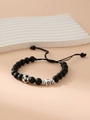 Adjustable matte black beaded bracelet featuring soccer charm and white letter Q cube bead - Letter Q