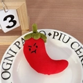 Cute plush chili keychain accessory with angry expression on warm wooden table - Chili (No Buckle)