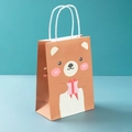 Cartoon brown kraft paper gift bag with cute bear holding a pink gift box and white handles - Gift Bear