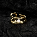 Vintage-Ring aus Gold mit unregelmäßigen Linien und weißer Perle auf Papier - Einstellbar Offen / Gold