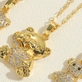 Golden bear pendant necklace with white crystals and polished finish on fine link chain - Hip Hop Bear
