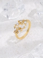 Detailed shot of 18K gold adjustable leaf ring featuring micro-pave cubic zirconia crystals - Gold