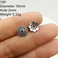 Macro shot of 10mm silver flower petal bead caps for DIY jewelry making and beading - Style 10