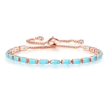 Makro-Detail eines verstellbaren rotgoldenen Tennisarmbands mit türkisfarbenen Zirkonia - Roségold + Blauer Türkis