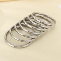Detailed view of polished silver metal rings set for DIY accessories and hardware - Steel Color 7-Piece Set