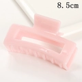 Detail view of a 8.5cm pink rectangle hair claw clip on a white ceramic tray - Jelly Pink (S150-15) / 8.5cm