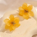 Chic 3D layered yellow acrylic flower stud earrings with golden pistils on wave stand - Turmeric
