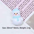 Miniature resin snowman charm in white and light blue, measuring 30mm by 18mm - Snowman / Snowman