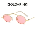 Lunettes de soleil punk avec monture en métal doré et verres océan roses sur fond blanc - Monture Dorée Verres Roses