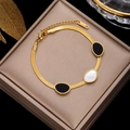 Gold stainless steel snake chain bracelet with black and white oval inlay details - Gold Snake Chain with Black & White Oval Inlays