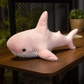 Pink shark plush toy made of soft fabric on a wooden table with embroidery details - 30cm / Pink