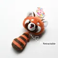 Detailed view of red panda plush keychain with functional zipper for small storage - Panda Guoguo Head Pendant