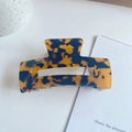 Elegante pinza per capelli con motivo a tartaruga e finitura in acetato lucido - Stampa leopardata