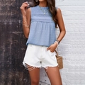 Women's blue sleeveless blouse with delicate lace trim and subtle polka dot pattern - S / Blue