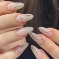 Faux ongles amande rose brillant avec lignes de vagues dorées pour un style élégant - Style avec Colle (Y-296)