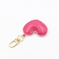 Pink heart-shaped PU leather keychain with gold metal ring and decorative stitching - With Buckle / Rose Red