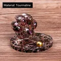 Cat paw crystal ornament with colorful tourmaline stones and resin on a wood base - Tourmaline